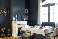 Dark blue and white dining room 