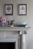 Mantelpiece and wall painted in muted tones 
