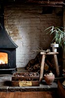Large fireplace with wood burning stove 