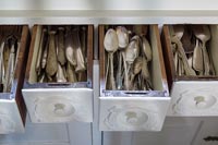 Silver cutlery in individual drawers 