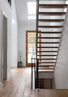 Open staircase in modern hallway 