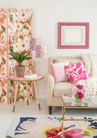 Colourful modern living room with decorative floral screen 