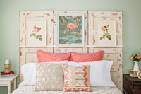 Distressed wooden headboard with paintings 