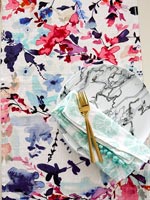 Colourful patterned table cloth on dining table 
