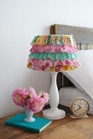 Lampshade covered in colourful fabric 
