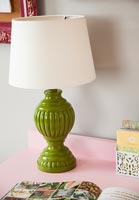 Green ceramic lamp with white lampshade 