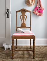 Wooden chair - seat covered with pink and white t-shirt material 