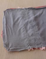 Off cuts of material from old t-shirts sewn together 