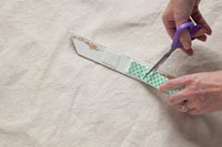Cutting strips of adhesive 