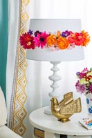 Decorative flower wreath on lampshade 