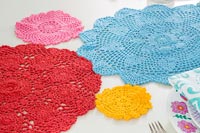 Crocheted mats on dining room table 