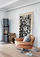 Wood burning stove in modern living room 