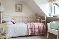 Country bedroom with iron day bed 