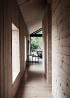 Corridor in contemporary wooden cabin 