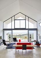 Contemporary living room with views of countryside 