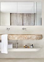 Modern bathroom with stone sink 