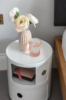 White cylindrical bedside cabinet 