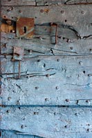 Detail of old wooden studded wall 
