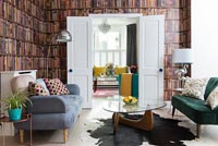 Modern living room with bookcase wallpaper