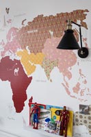 World map mural in childrens bedroom 