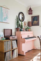 Pink piano and portable turntable 