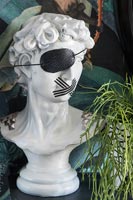 Classic bust - sculpture with black eye patch 