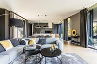 Contemporary open plan living space with dining area and kitchen  