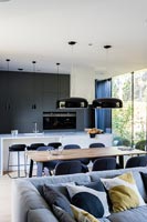 Contemporary open plan living space with dining area and kitchen  