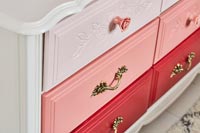 Chest of drawers with drawers painted in different colours 