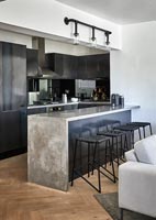 Contemporary kitchen with concrete worktop