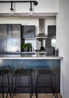 Contemporary kitchen with concrete worktop