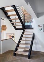 Contemporary black and wooden staircase 