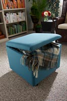 Blanket in small footstool 