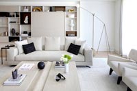 Modern white sofa in living room 