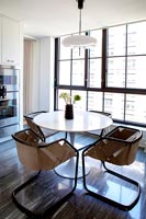Small tulip table in modern kitchen diner 