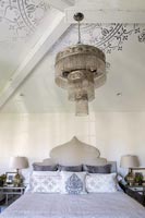 Ornate chandelier in the bedroom