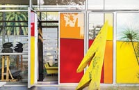 Coloured glass doors of contemporary industrial house 