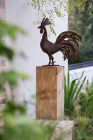 Cockerel sculpture outside 