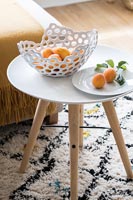 Modern bowls on side table 