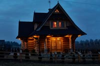 Wooden house at night 