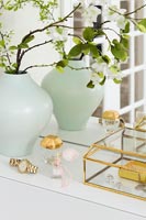 Golden accessories on dressing table