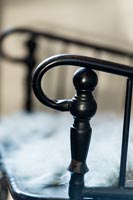 Close up ironwork on chair 