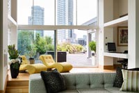 Modern living room with city view 