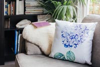 Floral cushion on sofa 