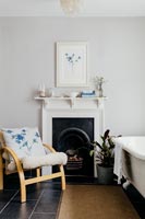 Classic fireplaces and armchair 