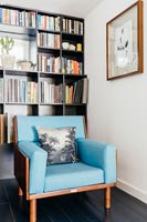 Vintage armchair and bookcase 