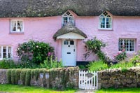 Pretty pink painted cottage 