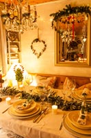 Dining room table decorated for Christmas 