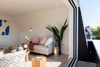 Modern living room with open sliding doors 