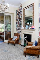 Classic leather chairs and fireplace 
